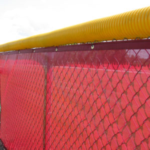 Yellow Poly-Cap installed on Fence with Red VCP windscreen by Douglas