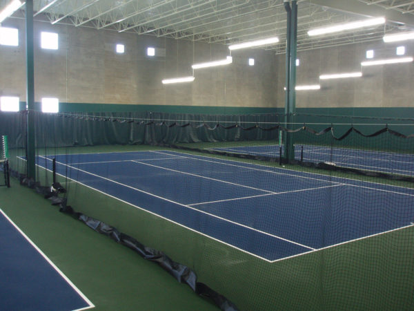 Douglas Divider Curtains installed in an indoor tennis court facility