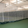 Douglas Divider Curtains installed in an indoor tennis court facility