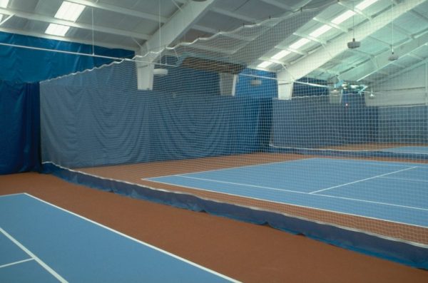 Douglas Divider Curtains installed in an indoor tennis court facility