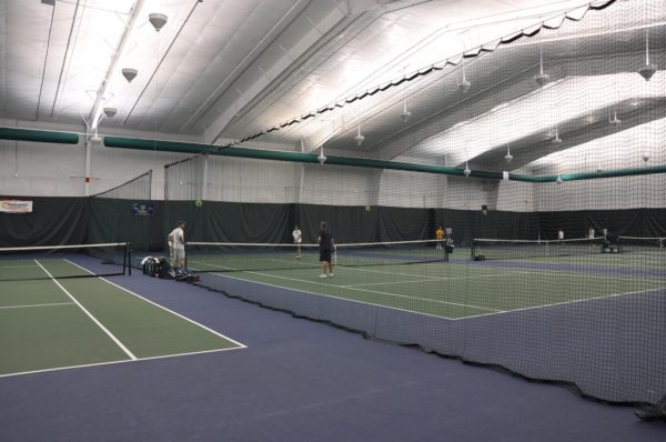 Douglas Divider Curtains installed in an indoor tennis court facility