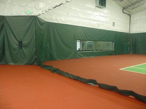 Douglas Divider Curtains installed in an indoor tennis court facility