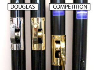 Newsfeed-Premier-XS-Comparison-1 - Douglas Sports Equipment Close-up of four locking latches on black posts, labeled DOUGLAS and COMPETITION.